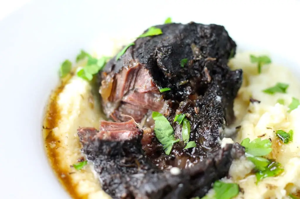 Keto Beef Cheeks with Cauliflower Mash recipe by Aussie Keto Queen. Another Keto Slow Cook dish by Aussie Keto Queen. This recipe for Keto Beef Cheeks remains one of my most popular recipes, even though they are notoriously ugly and difficult to photograph. Now I have some new photos, hopefully a few more people can see how succulent that meat is and give it a shot! #keto #ketogenicdiet #ketorecipe