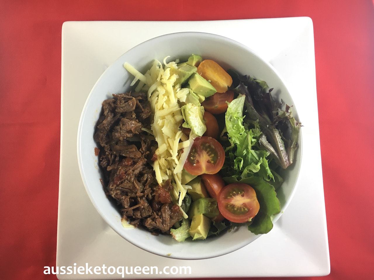 Slow Cooked Mexican Beef Fajita Salad by Aussie Keto Queen. Slow cooked for 8 hours, this spiced beef becomes meltingly tender. Combined with fresh salad, sour cream and cheese, a quick weeknight meal is on the table in no time. LCHF