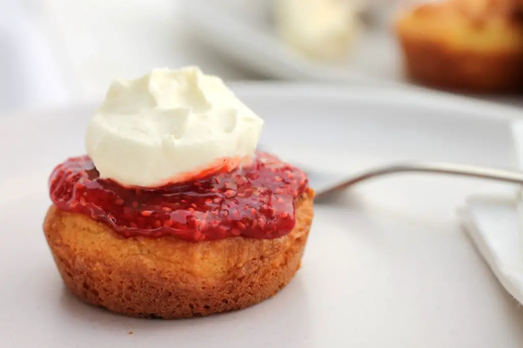 Keto Scones, Jam & Cream – The Ultimate Keto & LCHF Afternoon Tea BY AUSSIE KETO QUEEN A quick and easy snack for any occasion, these Keto Scones served with Keto Strawberry Jam are the perfect snack. Serve with whipped cream!  Keto scones are perfect for any occasion and are lovingly served with Keto Strawberry Jam and Whipped cream. Enjoy! #keto #easyketo #lazyketo #ketosnacks