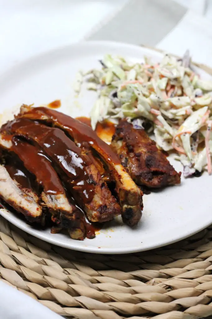 These Keto Ribs are so easy to prepare in the slow cooker giving succulent, fall off the bone meat. Finished with the pan juices as a smokey BBQ Sauce, these are finger licking good keto ribs!
