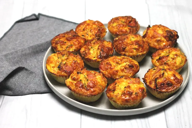 Keto Ham and Zucchini Muffins are the perfect savoury breakfast or easy keto lunch idea! Parmesan cheese gives them a crispy top and they are ready so quickly.