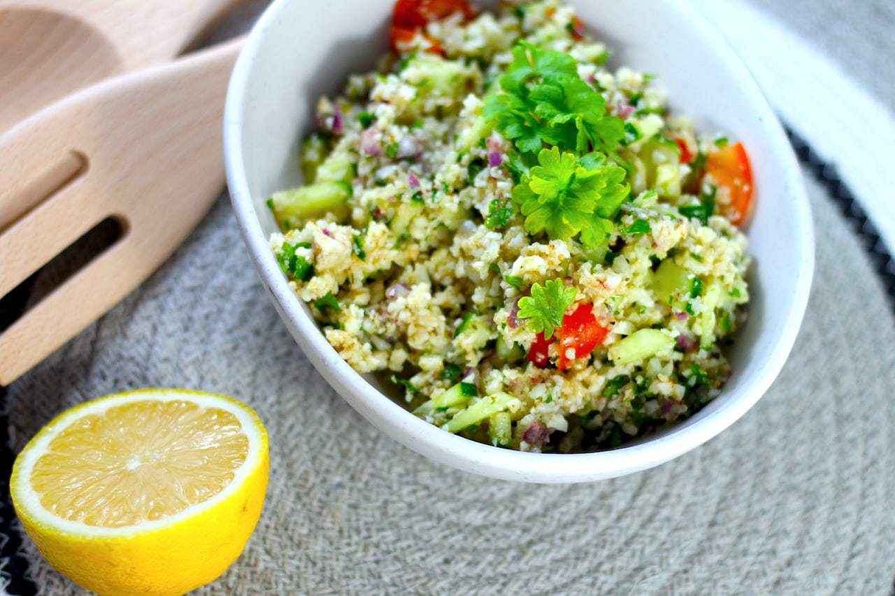 Keto TaboulehKeto Tabouleh Salad with Cauliflower by Aussie Keto Queen. This fresh and vibrant salad uses plenty of fresh herbs and cauliflower to create a tasty and quick side #keto #ketorecipes #ketogenicdiet