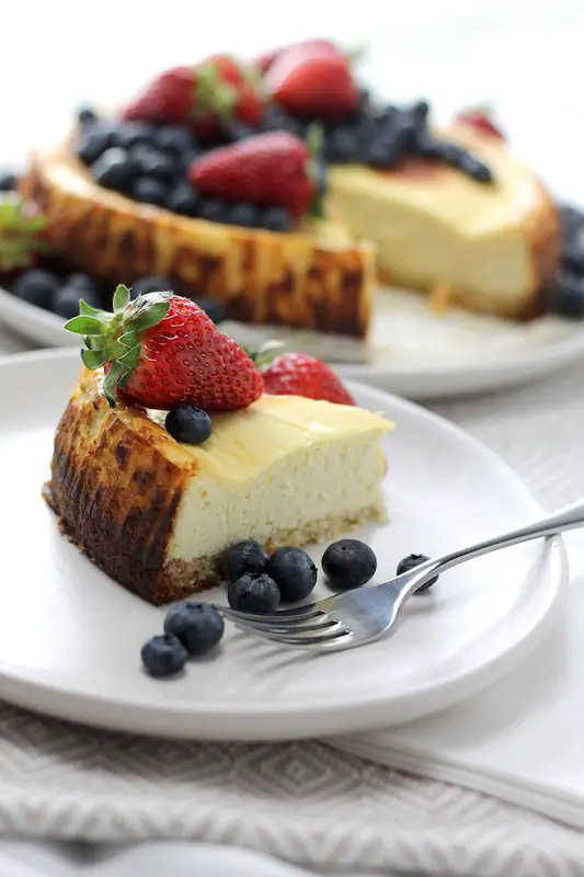 Keto Ricotta Cheesecake by Aussie Keto Queen. A delicious Keto Dessert perfect for Summer, this Low Carb Keto Ricotta Cheesecake is so impressive, your friends and family won’t even know they’re eating healthy. Delicious, simple and so decadent, topped with fresh berries. #summerdessert #ketodessert #ketocheesecake #ketogenicdiet