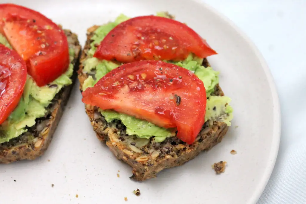 Keto Seed Bread is the perfect Keto lunch or snack. Loaded with nutrients and super easy to make, it will become a regular in your keto diet. #keto #aussieketoqueen #ketolunches #ketolunch