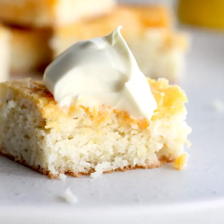 Keto Lemon Curd Cake by Aussie Keto. Keto Lemon Curd Cake is tangy, luscious and decadent and a great low carb afternoon treat or dessert! A delicious afternoon treat, this Keto Lemon Curd Cake has a moist cake almond meal base, topped with tangy, rich lemon curd. Serve with a dollop of thickened cream for an indulgent treat!