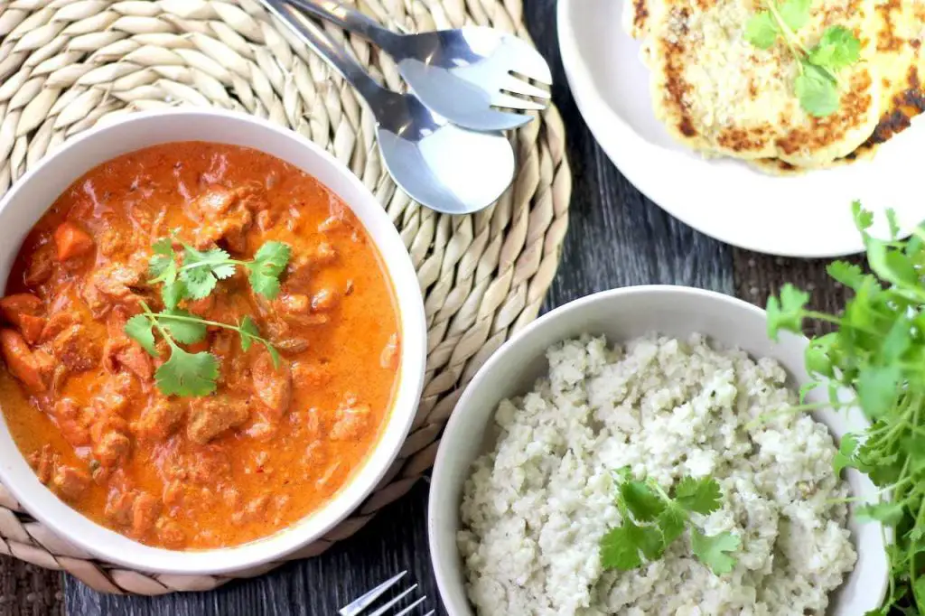 Keto Butter Chicken, Garlic Naan & Coconut Rice by Aussie Keto Queen. Prepare the chicken and marinade ahead for a deep flavour. The tastiest Keto butter chicken recipe out there - accompanied by garlic naan and coconut rice! 