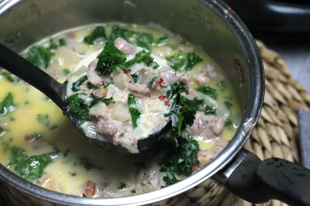 Keto Zuppa Toscana Soup by Aussie Keto Queen. Keto Zuppa Toscana Soup is not your typical soup! It is creamy, hearty, filling and a little spicy. Using Italian sausage brings an amazing depth of flavour and combined with bacon, the broth is so packed with flavour it will knock your socks off. The perfect winter Keto Soup!