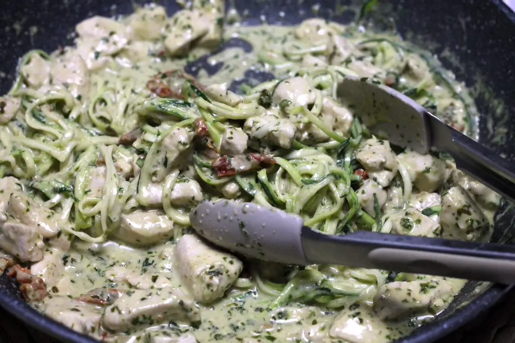 Keto Pesto Chicken with Zucchini Noodles by Aussie Keto Queen. This creamy fresh keto pesto chicken with zucchini noodles is ready in a flash and is loaded full of flavour and healthy fats, making it the perfect 30 minute keto dinner. 